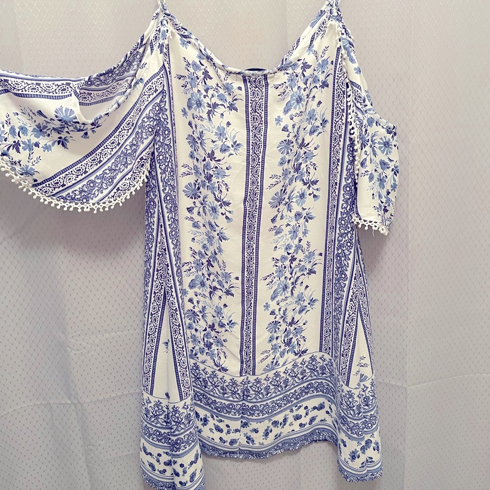 Cold shoulder blue and white floral dress with pompom design on sleeves